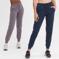 Pantalones de joggadores para mujeres Sportswear 4 vías Pantalones elásticos Pantalones de atletismo delgados Pantalones livianos Pantalones de chándal